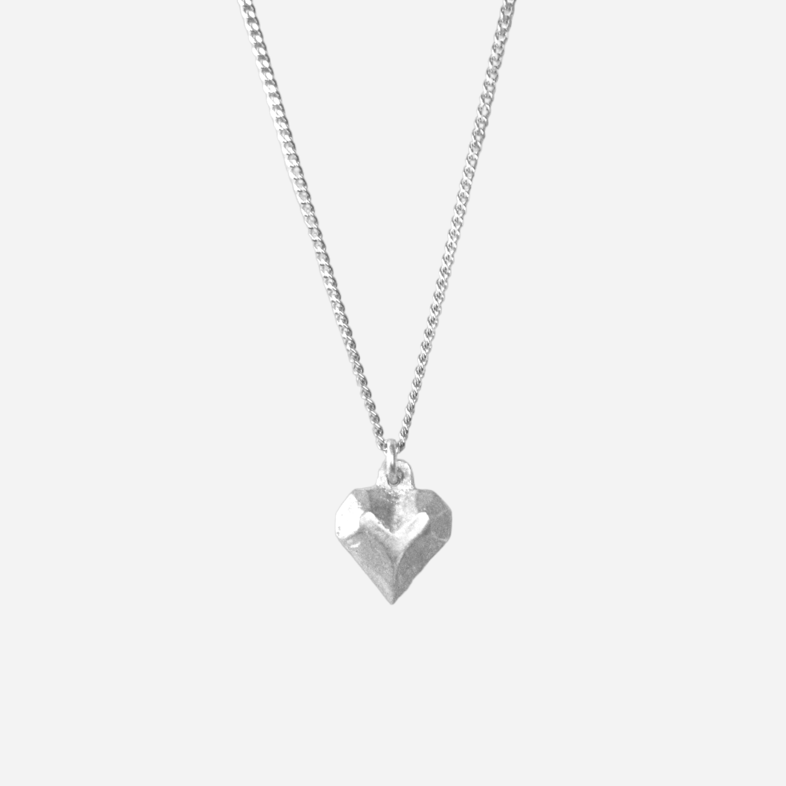 A heart necklace – Atend Studios